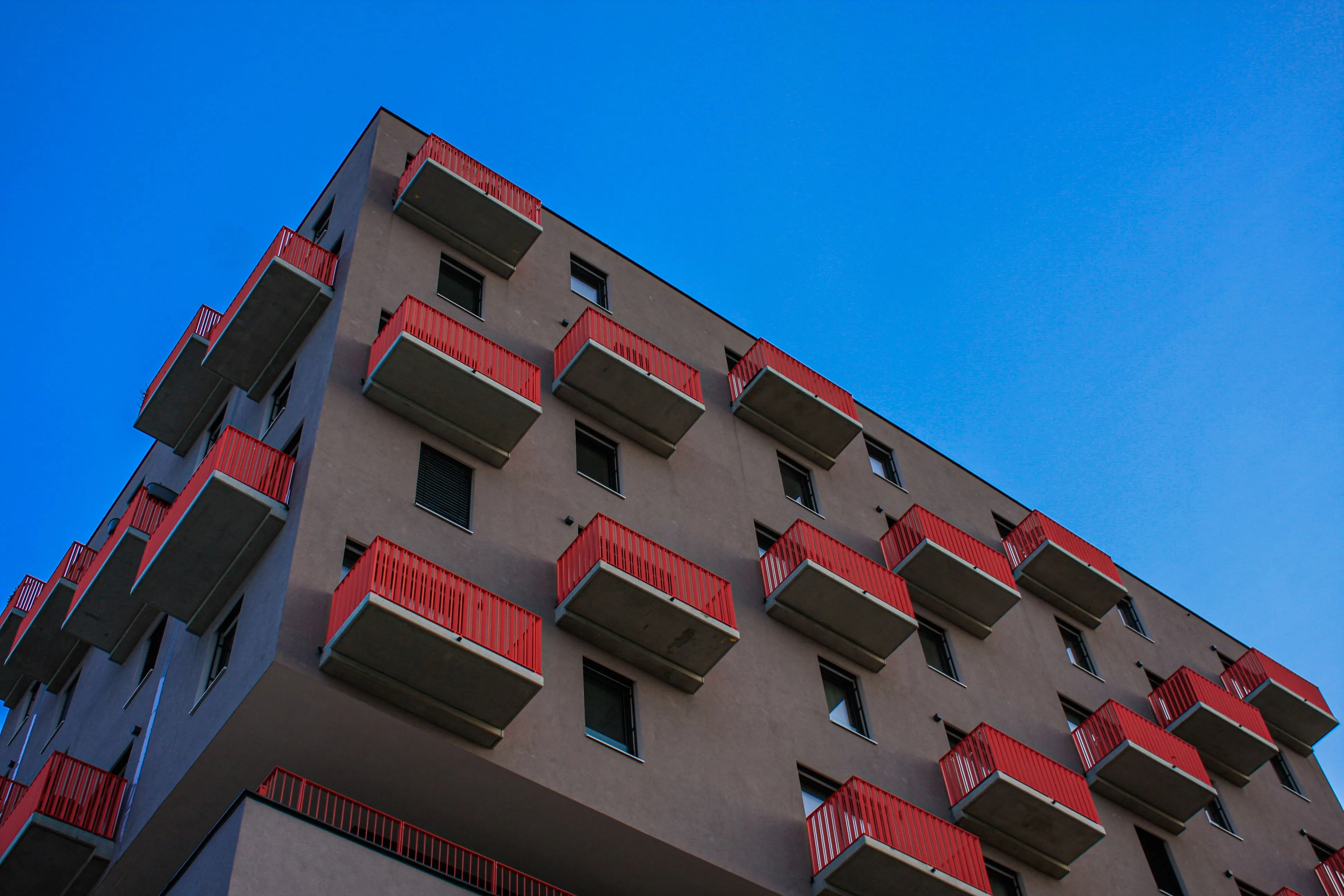 Modern Colorado apartment building against a blue sky