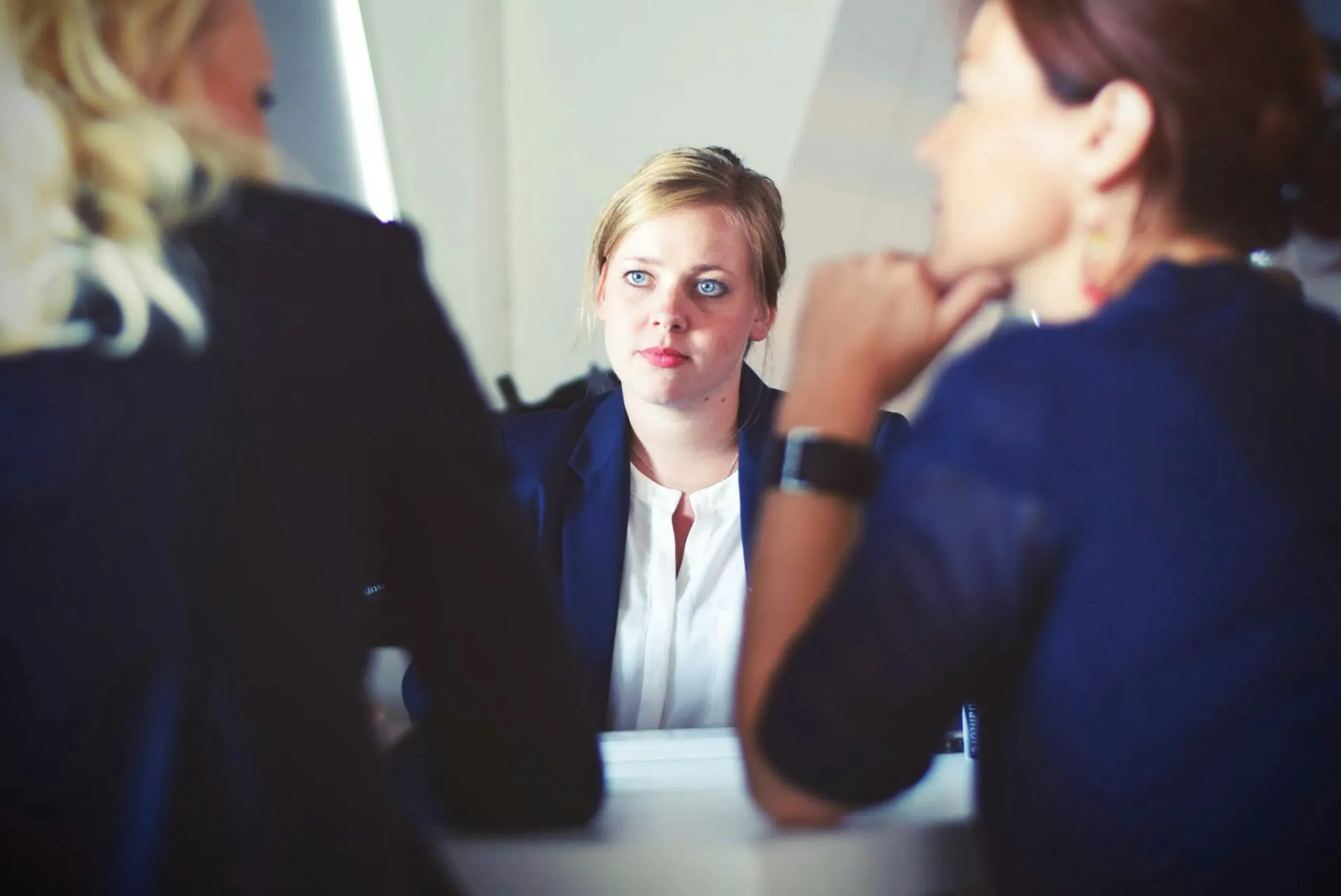 A client meeting with an attorney across a table